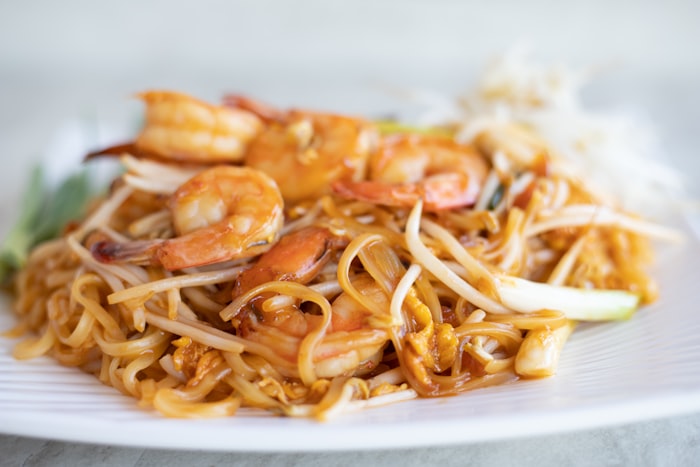 Pad Thai with shrimp, lime, and peanuts